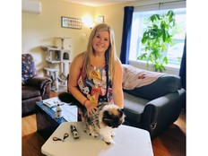 Sabrina Burroughs is the owner of Sabrina's Mobile Cat Grooming. She offers her service throughout the South Shore and focuses not only on the actual grooming but making the experience positive for both owner and cat. With Burroughs is feline friend Bella. STEVEN FLOWERS AND NIKITA HILL