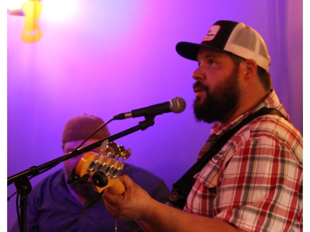 In the foreground, Steven Berryman, owner of Portside Pub in Yarmouth, along with Juanita Berryman, has been one of the participants of the business's popular jam nights. Also pictured is Cory LeBlanc, who frequently hosts jams and performs at the pub. PETER SAULNIER