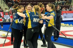 Nova Scotia's Taylour Stevens' rink celebrates after earning a playoff spot at the Scotties Tournament of Hearts on Thursday. From left are Stevens, Alison Umlah, Cate Fitzgerald and Maria Fitzgerald. Submitted by Andrew Klaver/ Curling Canada