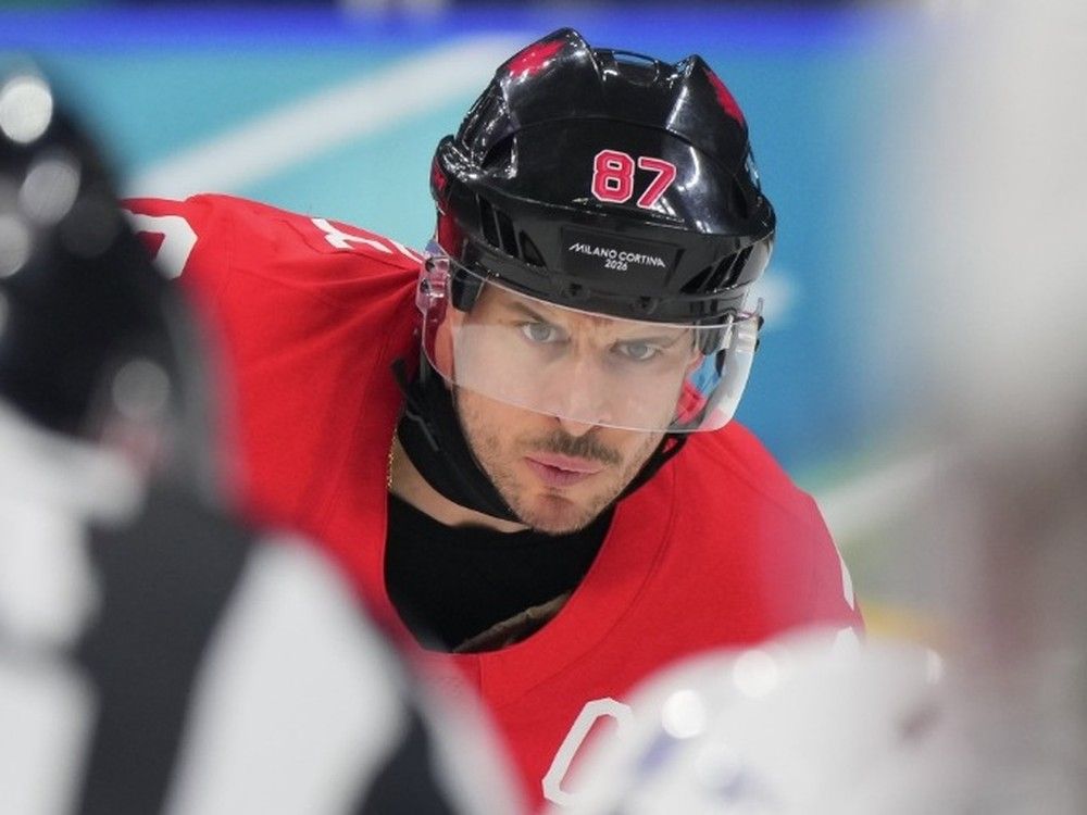 Sidney Crosby skates in Saturday practice, Team Canada coach says 'he's a game-time decision' for gold medal clash with U.S.