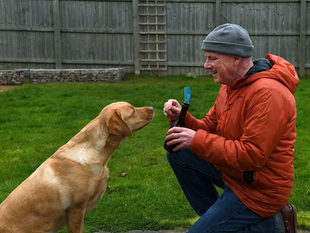Mike Scott, right, and his Labrador retriever, Maggie, prepare to uncork a bottle he found near the coast of Aberdeen, Scotland, two weeks ago. The bottle contained a message that said it had been tossed over the side of a ferry from P.E.I. to the Isles-de-la-Madeleine in August of 2024. Mike Scott, right, and his Labrador retriever, Maggie, prepare to uncork a bottle he found near the coast of Aberdeen, Scotland, two weeks ago. The bottle contained a message that said it had been tossed over the side of a ferry from P.E.I. to the Isles-de-la-Madeleine in August of 2024.