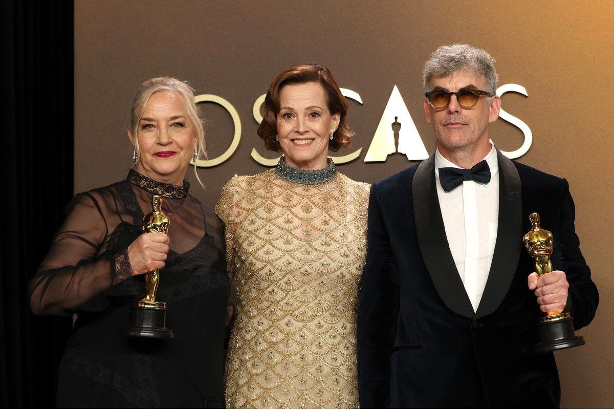  Tamara Deverell and Shane Vieau, Oscar winners for best production for Frankenstein, pose with Sigourney Weaver in the press room during the 98th Academy Awards at Dolby Theatre on Sunday in Hollywood, Calif.