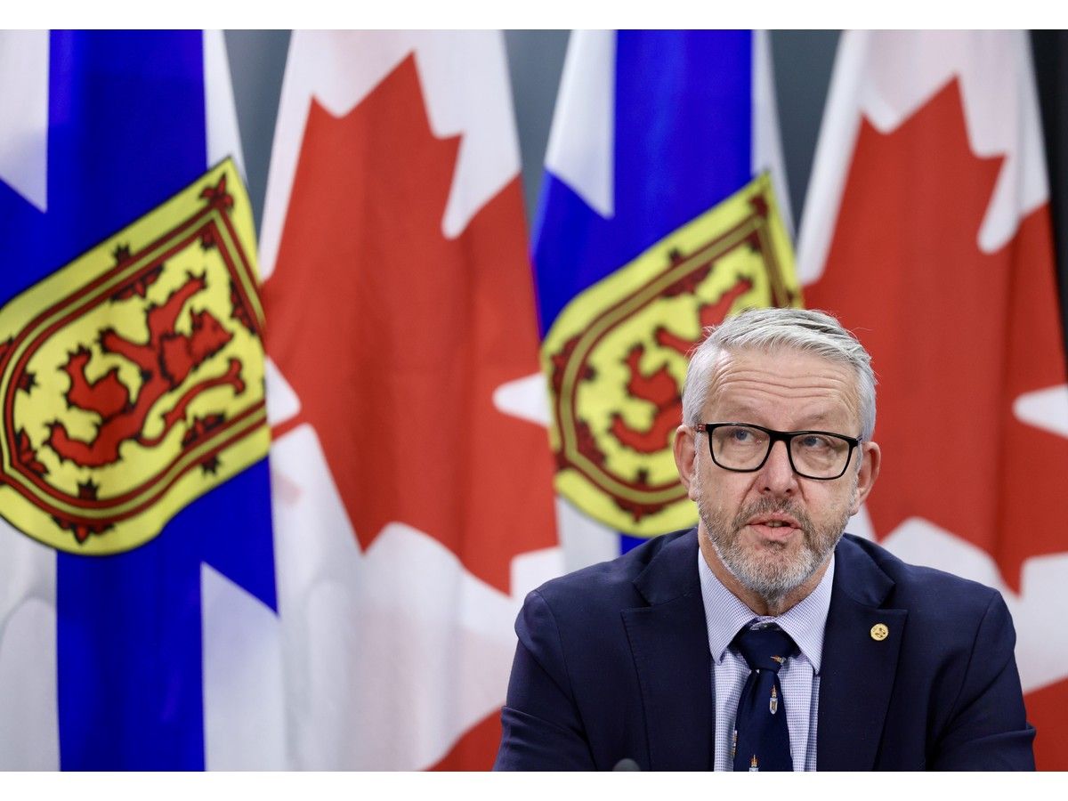 Finance Minister John Lohr answers questions from reporters at One Government Place in Halifax on Feb. 23, 2026.