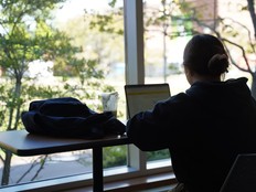 Samantha Lee studies at a window