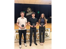Nolan LeFrense, middle, and Josephine Young, right, are pictured with Memorial High School's student of the year Rory MacDougall. LeFrense and Young were named the Sydney Mines school's athletes of the year for the 2025-26 season. CONTRIBUTED