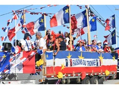 The sign on this colourful float in the Aug. 15 National Acadian Day Tintamarre as part of the Festival acadien de Clare encouraged people, in French, to 'Faisons de Tronne!', which translates to Let's Make Noise. The Acadians on the float celebrating their Acadian pride more than delivered on this. TINA COMEAU