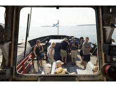 Passengers are seen through a bridge window on the William C. Ernst ferry on Wednesday, Aug. 5, 2026.