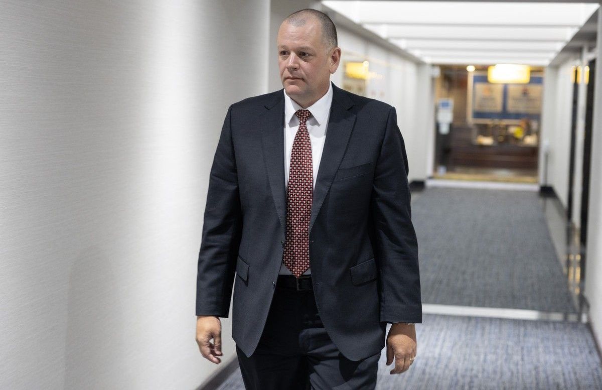 Chris Lanteigne, senior director of customer care for Nova Scotia Power, heads back into a Nova Scotia Energy Board hearing about last year's cyberattack following a break in proceedings on Tuesday.