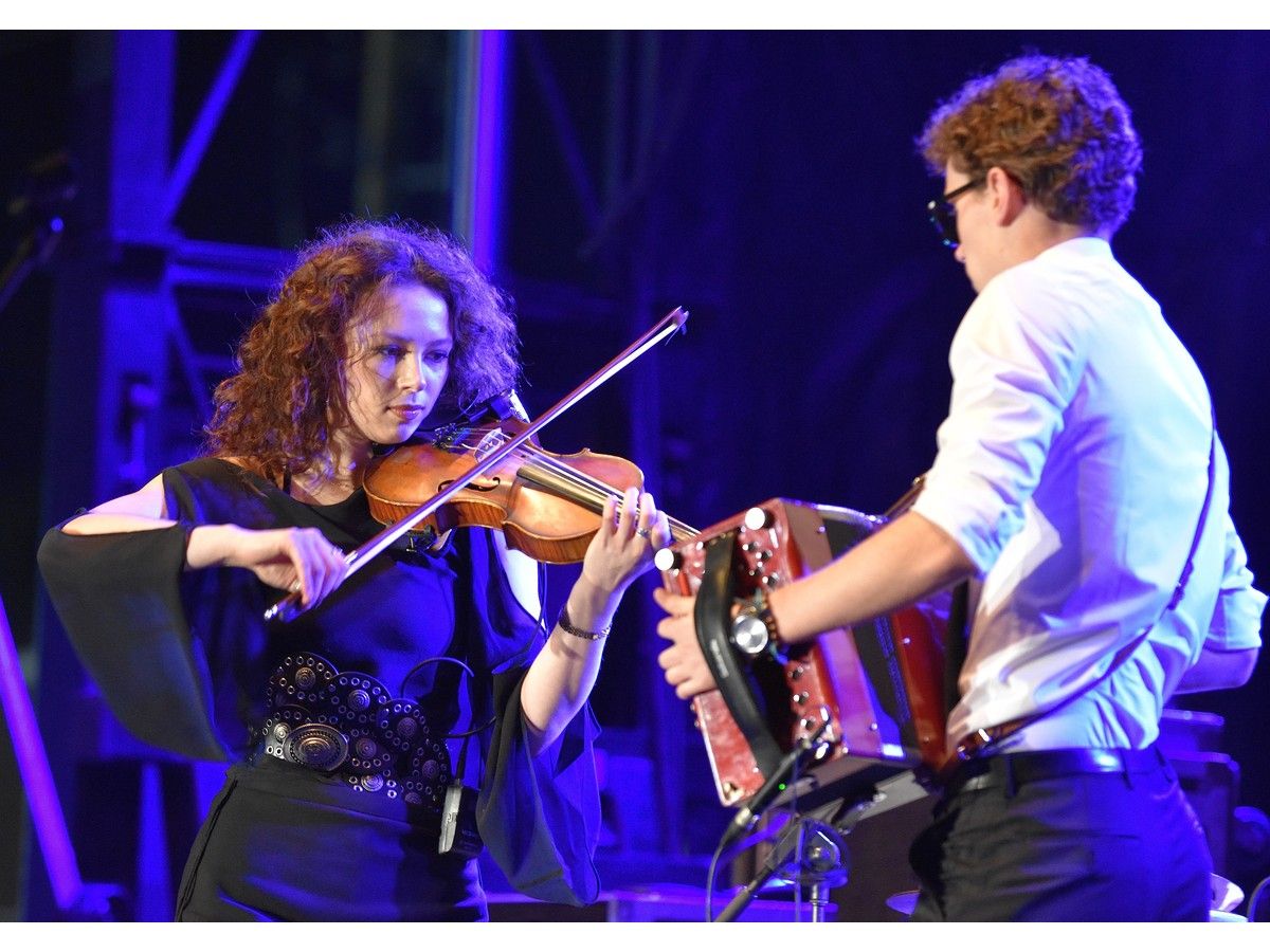 Mary Frances Leahy, left, performs alongside her brother Michael Leahy during the Kitchen Party kickoff concert for the Cape Breton Rodeo at Centre 200 in Sydney on Thursday evening. Leahy, the daughter of Natalie MacMaster, was the opening act of the event, which took place in the parking lot of the facility. Adam Baldwin and the Sam Roberts Band also performed on Thursday night. Doc Walker and High Valley were scheduled to perform on Friday night. Alan Doyle will also take the stage on Saturday night. JEREMY FRASER/CAPE BRETON POST