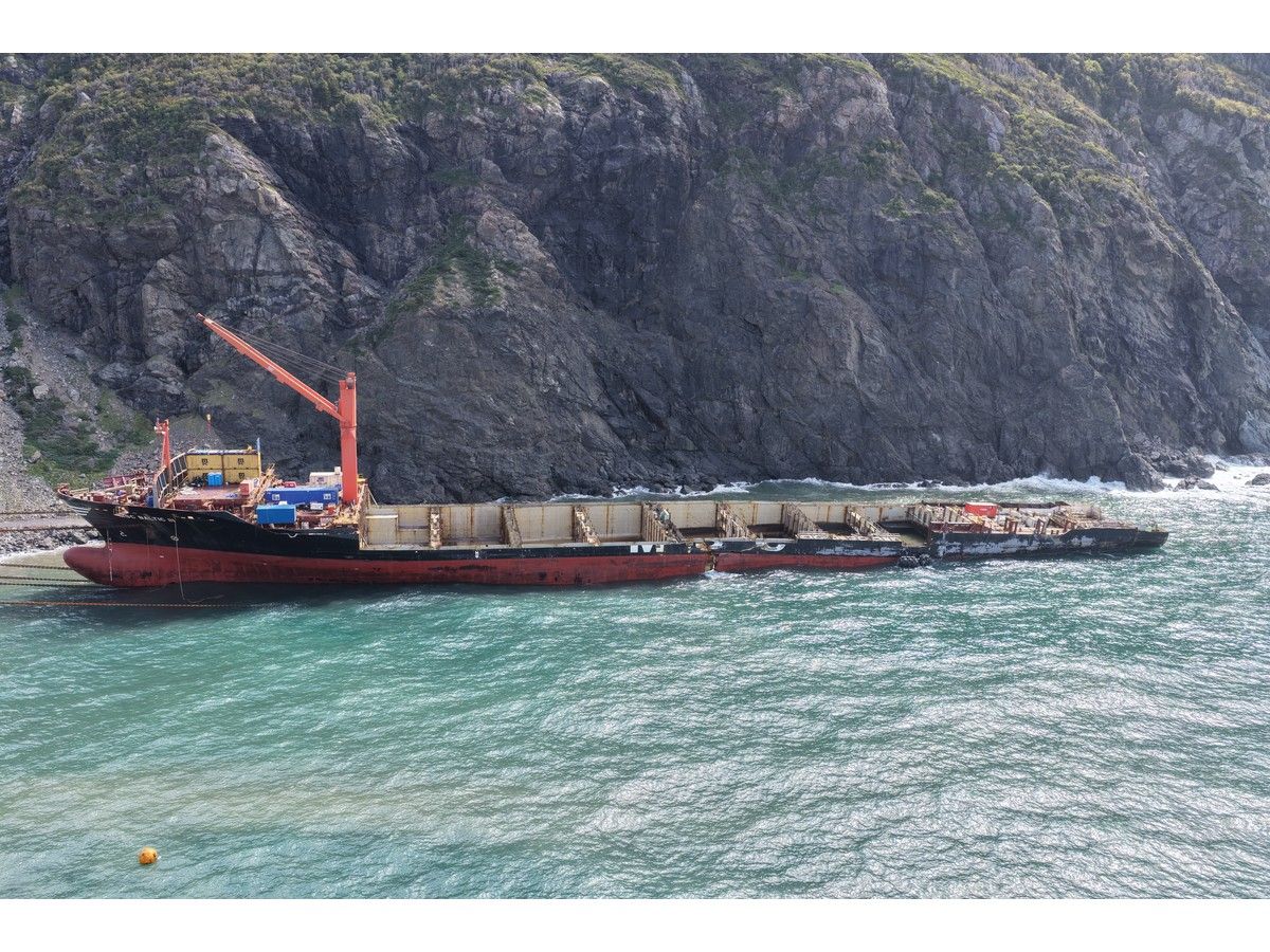 Haul aboard! First piece of grounded cargo ship pulled ashore in western NL