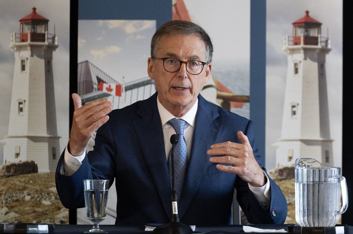 Bank of Canada governor Tiff Macklem answers questions from reporters during a news conference at the Halifax Convention Centre on Monday.