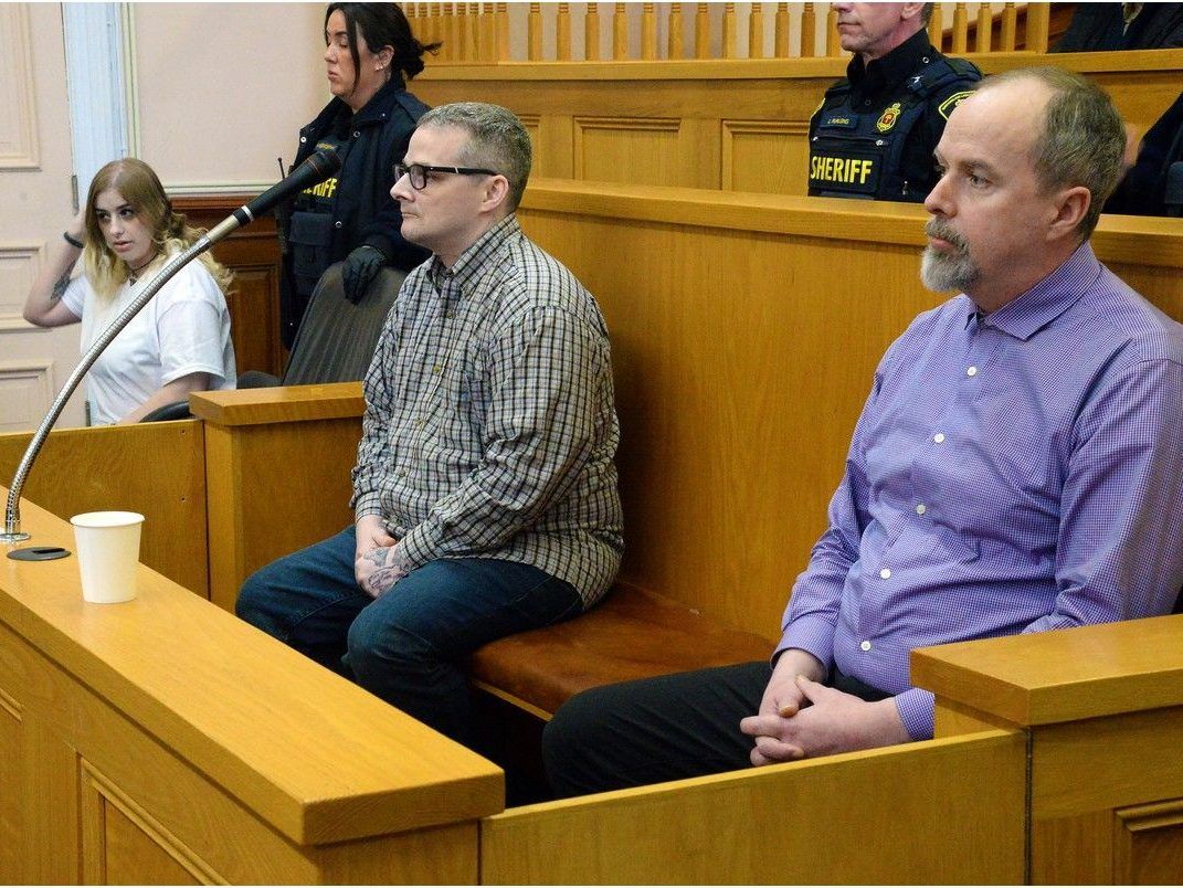 Stephanie Noftall, Terry Cole (center) and Matthew Kavanagh (right) sit in Supreme Court of Newfoundland's courtroom 4 at the start of their trial October 13, 2026.