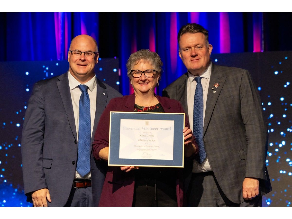 Nancy Crosby is the Municipality of Colchester's volunteer of the year. She received the award from Dave Ritcey, left, the province's minister of Communities, Culture, Tourism and Heritage, and Lt.-Gov. Mike Savage during a provincial awards ceremony in Halifax on Sept. 28.