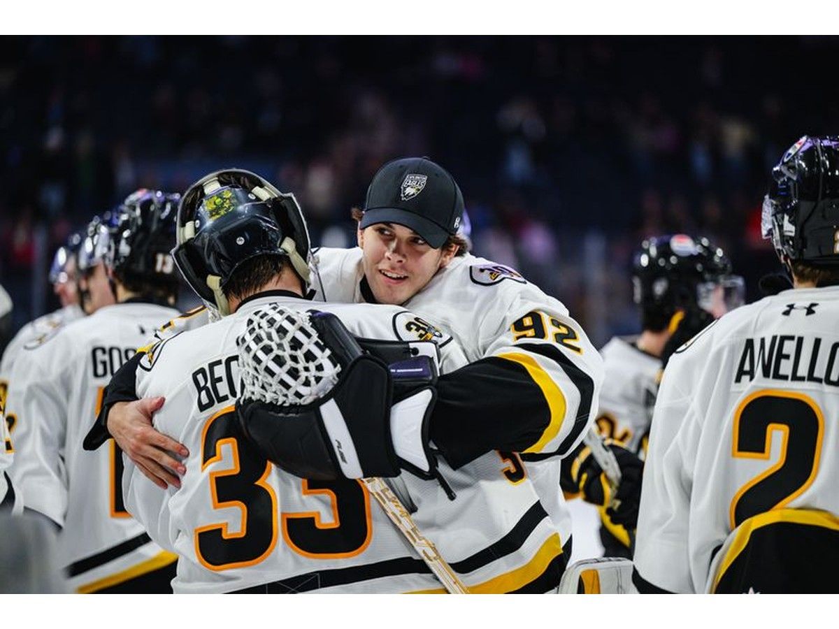 Sam Berthiaume shares a hug with goaltending partner Lucas Beckman after the Cape Breton Eagles 6-3 win over the Halifax Mooseheads in Quebec Maritimes Junior Hockey League action at Scotiabank Centre in Halifax on Friday. CONTRIBUTED/TREVOR MACMILLAN