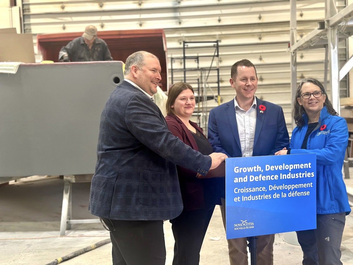An announcement supporting Nova Scotia's boatbuilding industry took place at Wedgeport Boats Ltd. in Yarmouth County on Oct. 26. The province is contributing $366,000 in funding to help strengthen the visibility of Nova Scotia boatbuilders and to attract new markets. From left are Yarmouth MLA Nick Hilton; Chelsea Hattie, part owner and accounts manager of Wedgeport boats; Colton LeBlanc, Argyle MLA and minister of Growth, Development and Defence Industries; and Jan Fullerton, the executive director of the Nova Scotia Boatbuilders Association.  TINA COMEAU