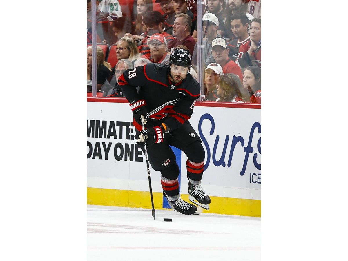 RALEIGH, NORTH CAROLINA - OCTOBER 13: William Carrier #28 of the Carolina Hurricanes skates with the puck during the first period of the game against Washington Capitals at Lenovo Center on September 13, 2026 in Raleigh, North Carolina.