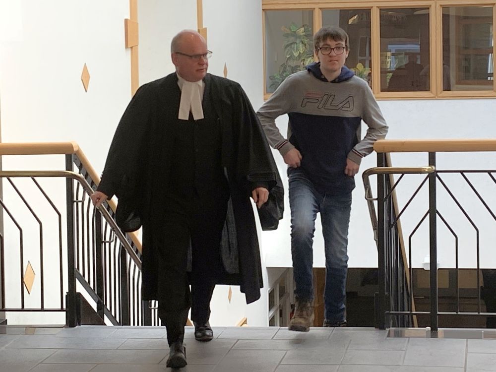 Convicted P.E.I. arsonist Dakota James Ellis with his lawyer, Brendan Hubley