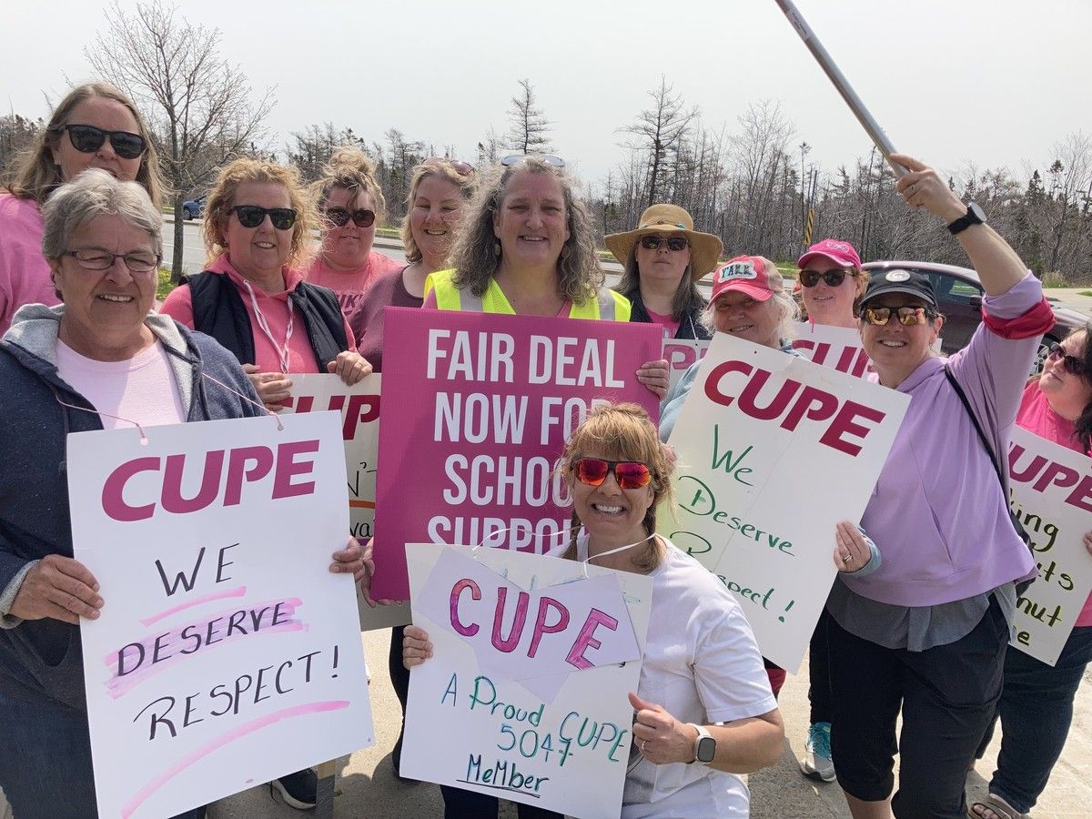 More than a dozen striking CUPE school support staff members on the picket line near the Halifax Regional Centre for Education office in Dartmouth on May 11, 2023.