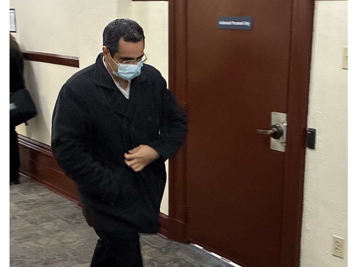 Former pharmacy manager Fady Markos Faltas enters Halifax provincial court Wednesday for the start of his sentencing hearing on five counts of voyeurism. The hearing will continue in January.