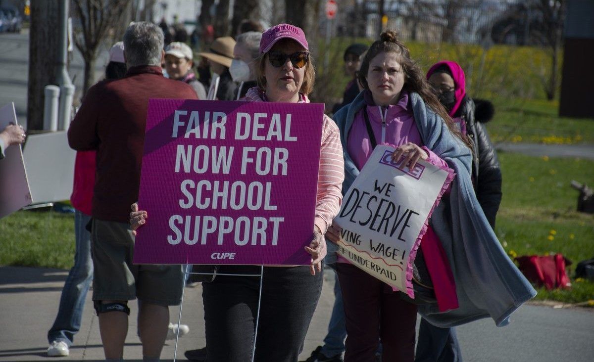 CUPE members and supporters rally in front of Citadel High School on May 10, 2023.