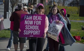 CUPE members and supporters rally in front of Citadel High School on May 10, 2023.