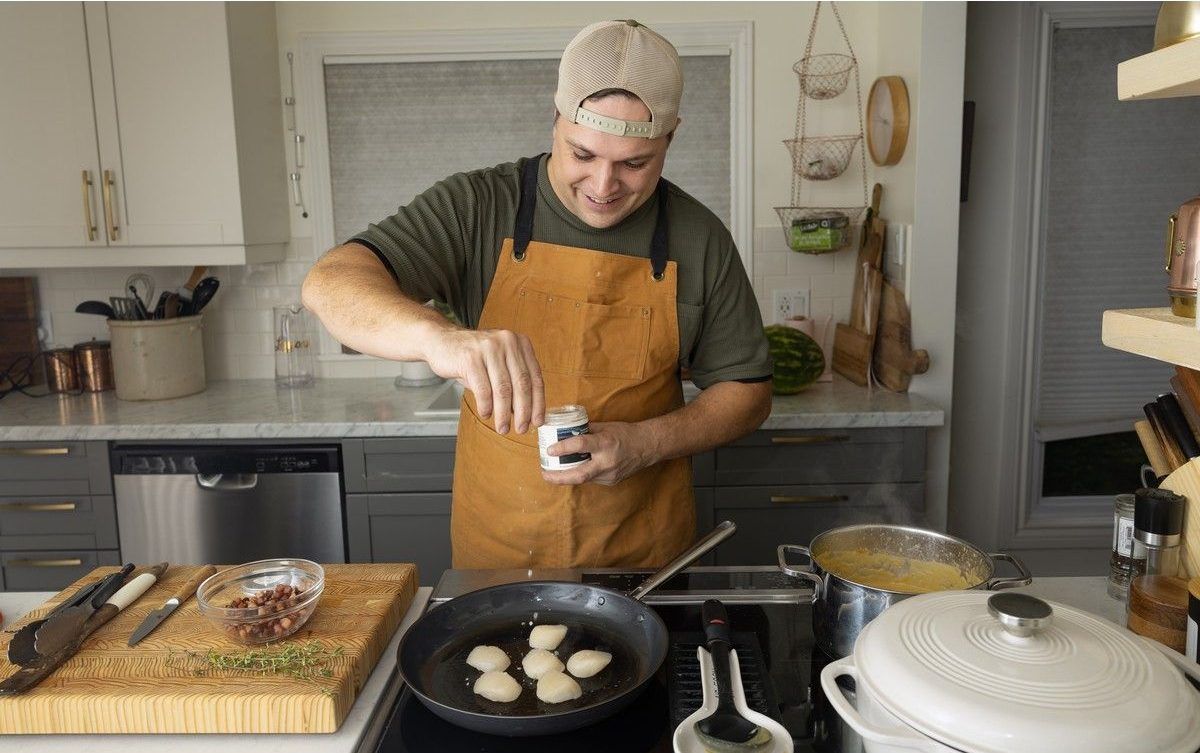 Chef Stephen Barrett, founder of The Seasoned Plate, makes a meal in his Waverley home on Tuesday, Sept. 29, 2026.