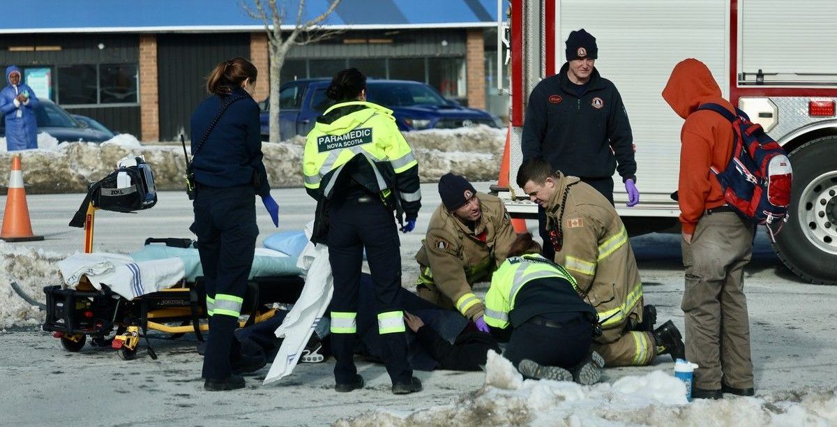 Halifax regional fire and EHS paramedics attended to an injured person following a car-pedestrian accident on Dartmouth Road at the Bedford Highway in Bedford on Feb. 10, 2026. One person was transported to hospital.