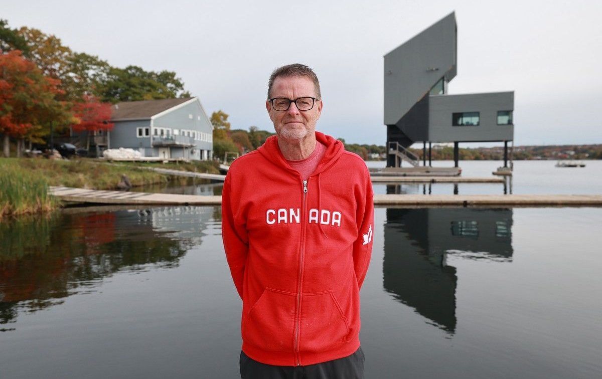 Ken Bagnell, CEO of the Canadian Sport Institute Atlantic, is proposing a $6.5 million expansion to the Lake Banook Paddle All Centre, which is the national training centre, at left. The expansion would include adding more washrooms and meeting rooms for national and international events and increase the size of their tight indoor training space. Bagnell is seen at Lake Banook in Dartmouth Friday October 16, 2026.