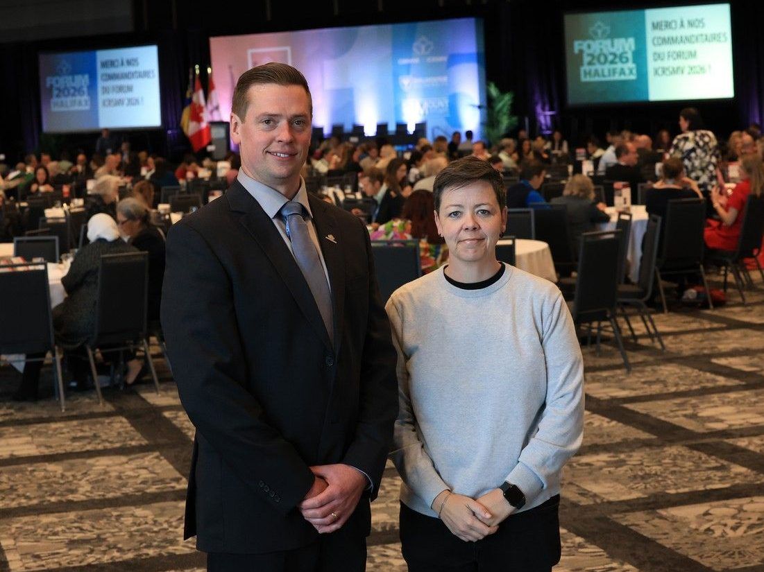 Nicholas Held, scientific director at the Canadian Institute for Military and Veteran Health and Carrie Esopenko from the University of Utah, are seen during a break at the National Military and Veteran Health Research Forum in Halifax on Tuesday Oct. 20.
