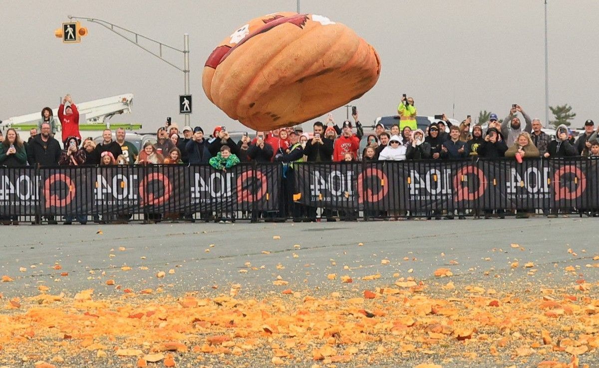 A 1,387-pound pumpkin is seen before hitting the ground after being dropped from 282 feet in the air during the annual Q104 pumpkin drop at the Mic Mac Mall parking lot on Friday, Oct. 30, 2026.