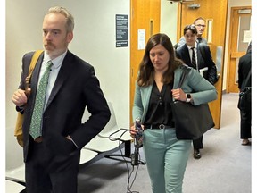 Defence lawyers Trevor McGuigan and Anna Mancini leave Dartmouth provincial court Thursday during a break at Evan Lloyd Wheadon's preliminary inquiry on a charge of second-degree murder. Wheadon, 21, is accused of killing Daniel Publicover, 27, during an altercation outside a home in Beaver Bank on Dec. 12, 2025.