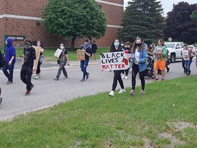 Participants in last weekend's Black Lives Matter events parade on the grounds at Algoma Uni versity.