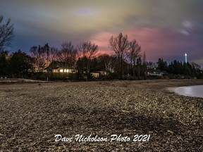 What caused that eerie red glow in the distance.Pink lightning? That was one suggestion when Southampton photographer Dave Nicolson posted this photograph on social media and later conmformed the glow was caused by flames over 100 feet high from a specality woodworking shop on Bruce?Saugeen Toewnline at the south end of saugeen Shores just after 112 p.m. March 24. Dave Nicholson Photography