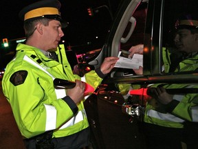 FILE: Police officers check drivers on B.C.'s roads in 2011. /