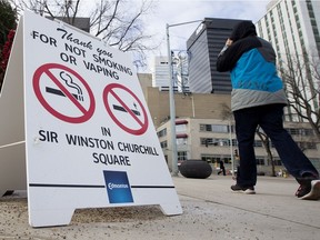 FILE - No vaping and no smoking signs at Churchill Square in Edmonton Alta.