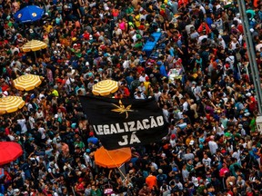 FILE: Hundreds of people take part in a march demanding the legalization of marijuana at Paulista Avenue, in Sao Paulo, Brazil, on June 1, 2019.