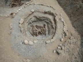FILE: The excavation of a tomb from an archaeological site in western China that provided evidence for the burning of cannabis at a cemetery locale roughly 2,500 years ago, is shown in this image from the Pamir Mountains in Xinjiang region, released from Beijing, China, on June 12, 2019. /