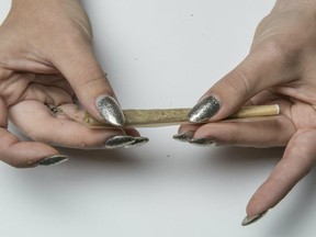 Person-rolling-joint