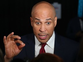 FILE: Sen. Cory Booker (D-NJ) speaks during a television interview after the Democratic Presidential Debate at Tyler Perry Studios Nov. 20, 2019 in Atlanta, Geo.