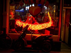 FILE: People sit inside a coffee shop on November 1, 2012 in the center of Amsterdam, Netherlands.