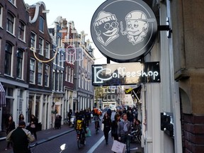 FILE: A picture taken on Oct. 31, 2011 in Amsterdam, shows the neon sign of a coffee shop.