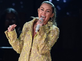 FILE: US singer Miley Cyrus performs onstage during the 61st Annual Grammy Awards on February 10, 2019, in Los Angeles. (ROBYN BECK/AFP via Getty Images)