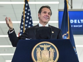 FILE: Andrew Cuomo, Governor of New York, delivers remarks during an opening ceremony of Delta's new terminal at LaGuardia airport on Oct. 29, 2019 in New York City. /