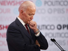 FILE: Former Vice President Joe Biden listens during the Democratic presidential primary debate at Loyola Marymount University on Dec. 19, 2019 in Los Angeles, Calif. /