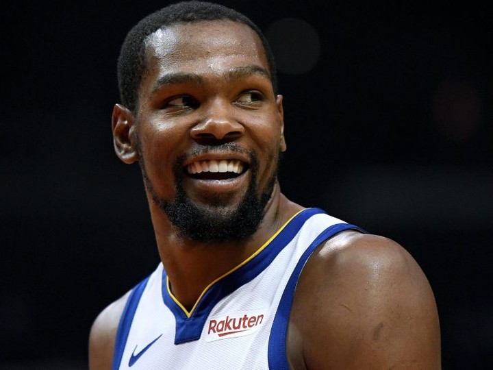  FILE: Kevin Durant #35 of the Golden State Warriors smiles at his bench in a 129-110 win over the L.A. Clippers during Game Six of Round One of the 2019 NBA Playoffs at Staples Center on Apr. 26, 2019 in Los Angeles, Calif. /