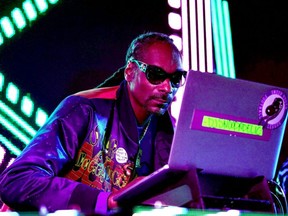 FILE: DJ Snoopadelic, aka Snoop Dogg, performs at the Rookie of the Year Party during Pepsi Zero Sugar presents Neon Beach at Clevelander at the Clevelander South Beach on January 30, 2020 in Miami Beach, Fla.