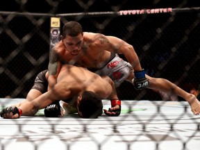 FILE: Journey Newson (top) on a technical knockout against Domingo Pilarte in their Bantamweight boutduring UFC 247 at Toyota Center on Feb. 08, 2020 in Houston, Tex. /