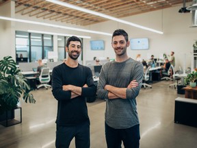 FILE: Dutchie's CEO Ross Lipson, left, and his co-founder brother and chief product officer, Zach Lipson, pose pre-pandemic at the Dutchie office in Bend, Ore. /