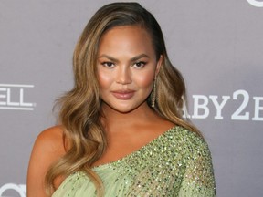 FILE: US model Chrissy Teigen arrives for the 2019 Baby2Baby Fundraising Gala at 3Labs in Culver City, Calif. on Nov. 9, 2019.