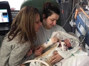 Baby Oscar Parodi with his mother, Chelsea, and grandmother Christine Bell.